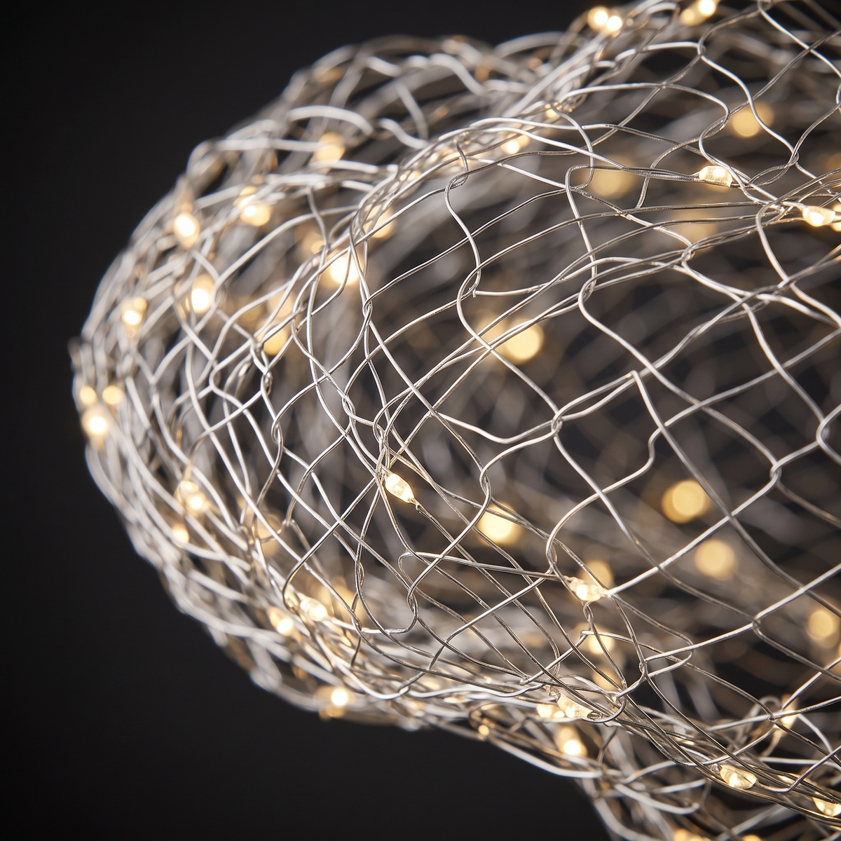 Close-up of the silver wire mesh and starry LEDs