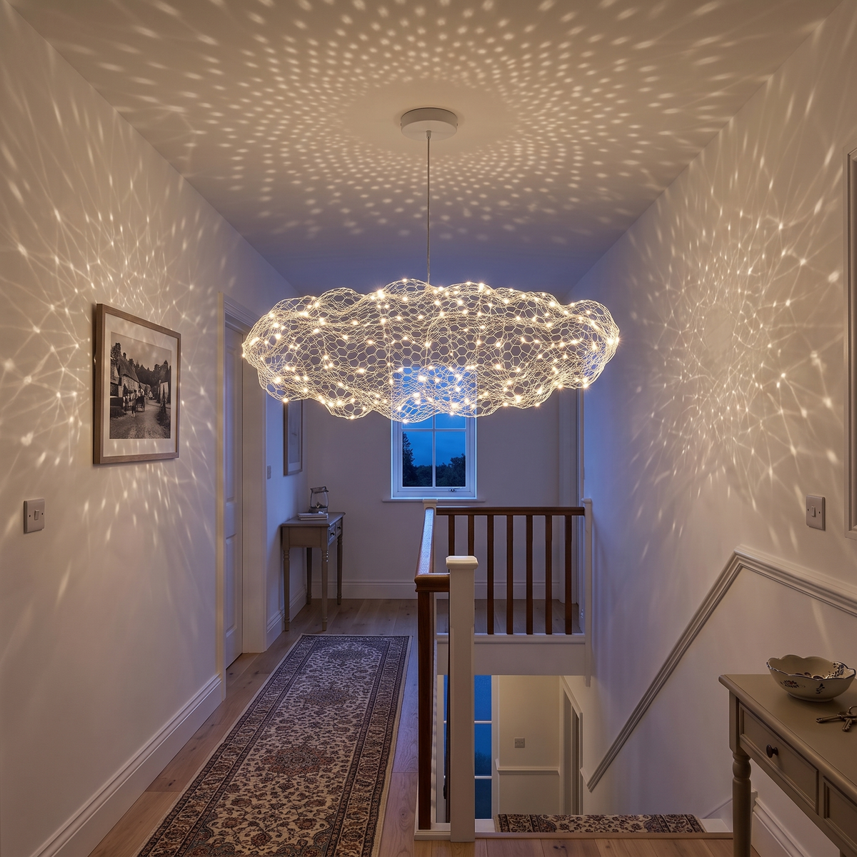 Cloud wire mesh pendant light in a hallway landing