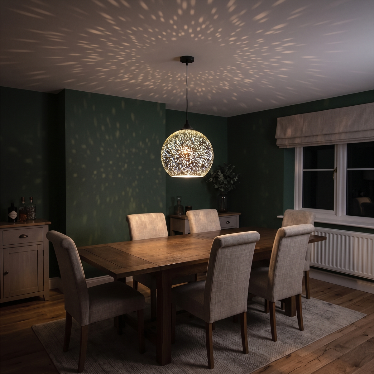 3D firework mirrored glass globe pendant over a dining table