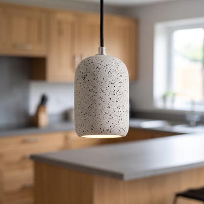 White speckled concrete mini pendant light, close-up in a kitchen