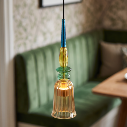 Amber ribbed glass mini pendant light, close-up in a dining nook