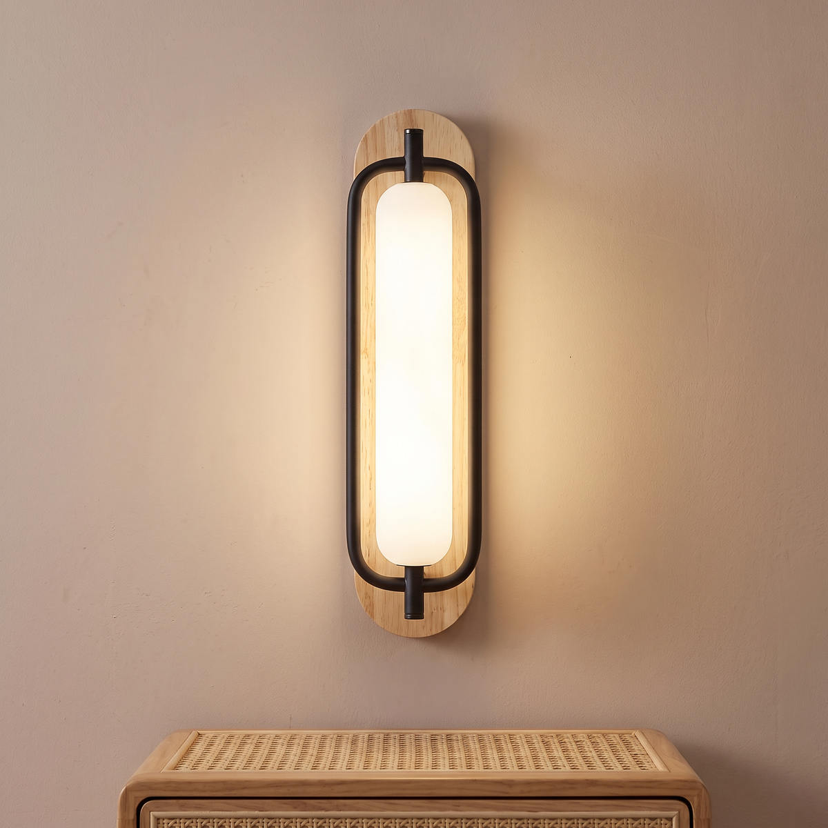 Natural wood and black capsule LED wall light, close-up beside a bed