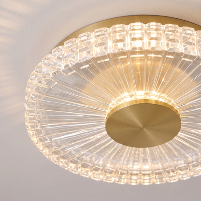 Close-up of the gold crystal-effect flush ceiling light, lit, showing the faceted cover