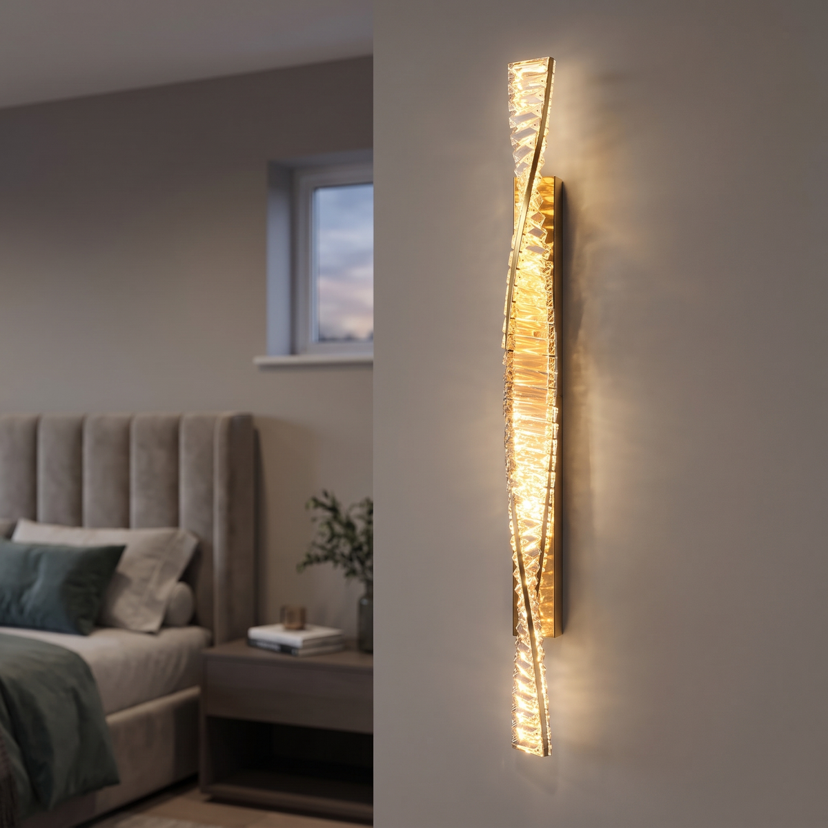 Twisted crystal gold LED wall light lit beside a bed in a modern bedroom