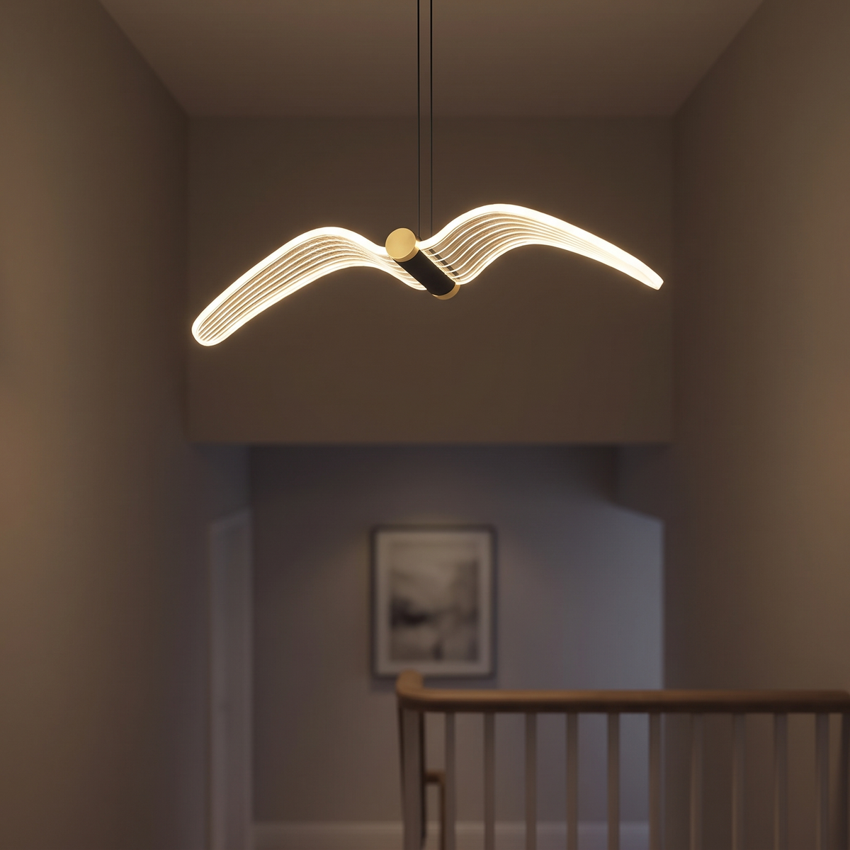 LED bird pendant light hung high in a stairwell at night