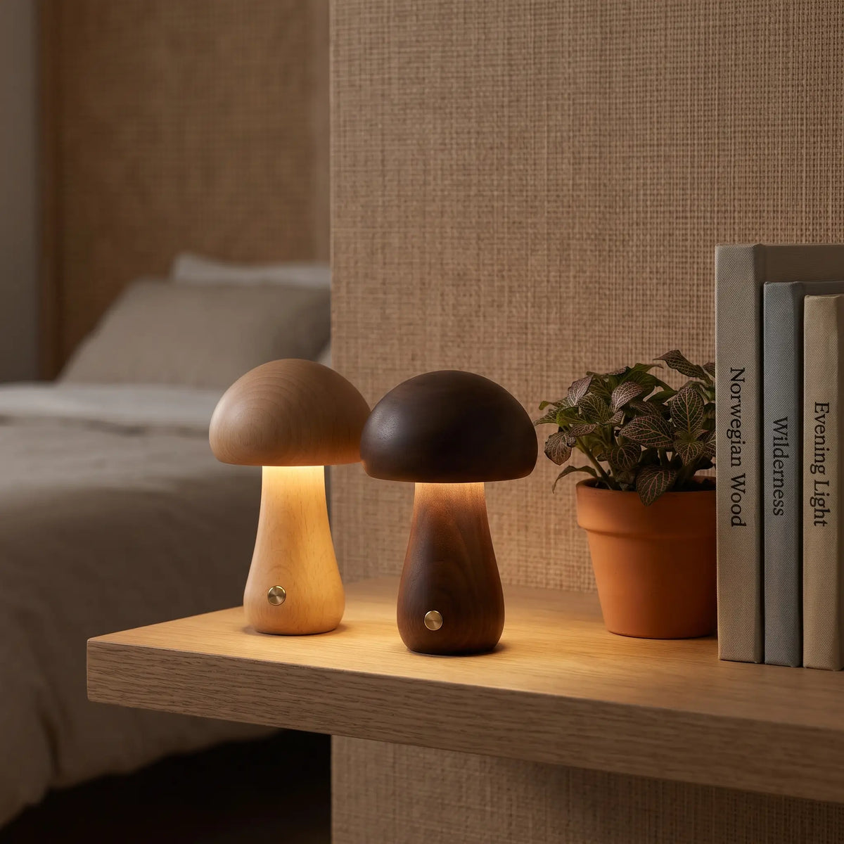 Beech and walnut wooden mushroom lamps on a bedroom shelf