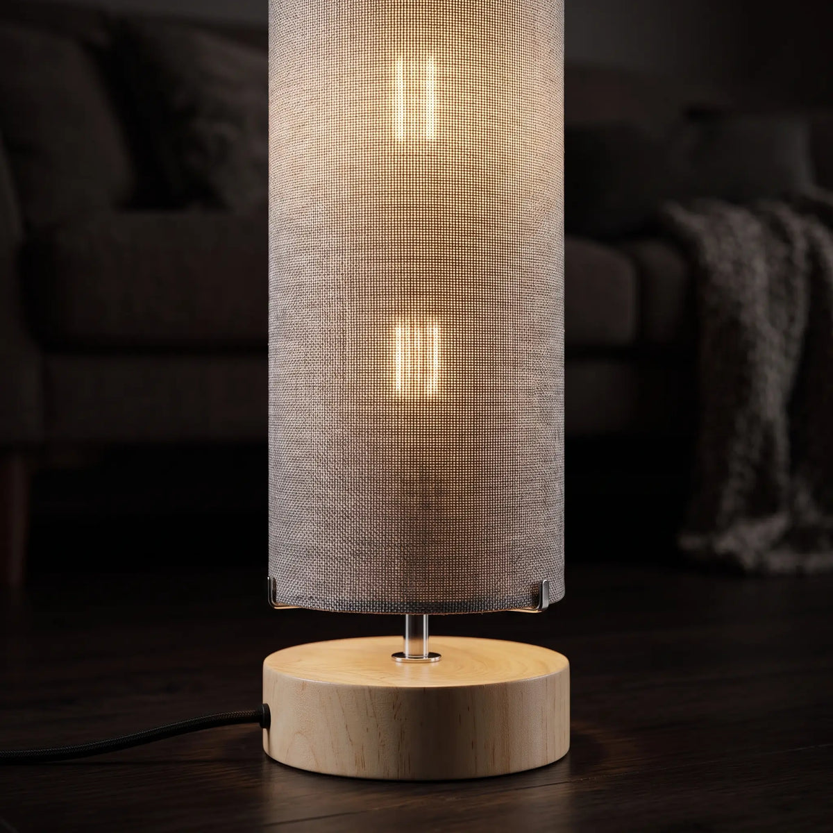 Close-up of the grey linen shade glowing
