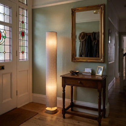 Grey linen column floor lamp in a hallway