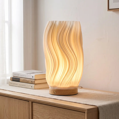 Breeze wavy ribbed table lamp with wooden base on an oak sideboard