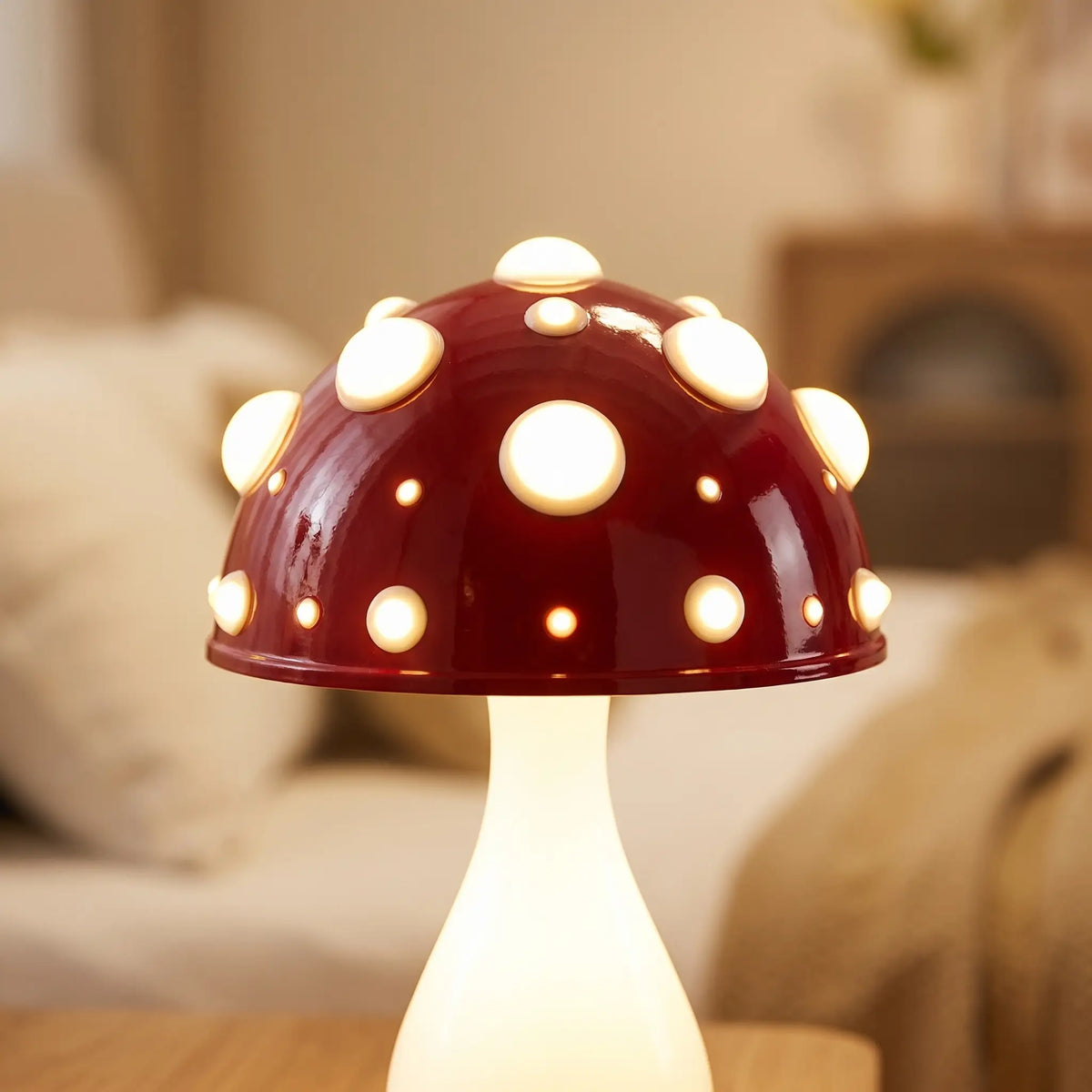 Close-up of the glowing spotted cap of the toadstool lamp