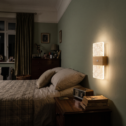 Crystal-effect motion sensor night light beside a bed