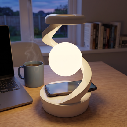 White floating spiral desk lamp with wireless charger on an oak desk, phone charging on the base