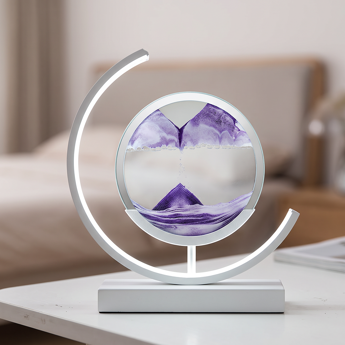 Close-up of purple quicksand flowing in the glowing sand art lamp